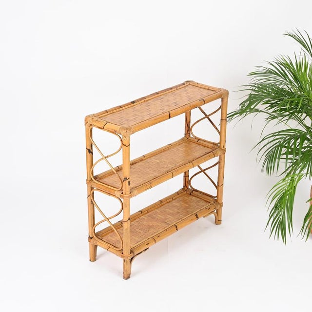 Stunning French Riviera style etagere or console table entirely made of bamboo, rattan and hand-woven wicker. This...