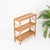 Stunning French Riviera style etagere or console table entirely made of bamboo, rattan and hand-woven wicker. This...