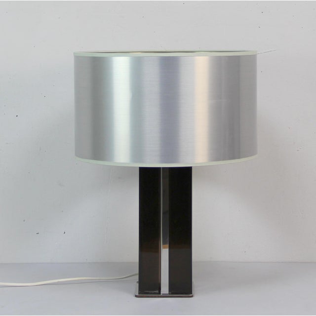 The silver screen is behind the foot European Plug (up to 250V).The wiring of this item may be original and might need...