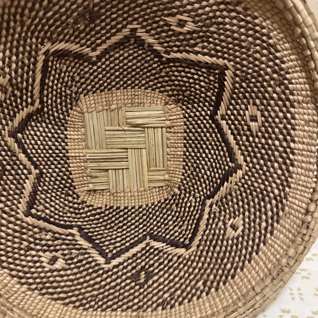 Vintage Tonga basket handwoven by artisans of the Tonga people of Southern Africa using traditional twining techniques...