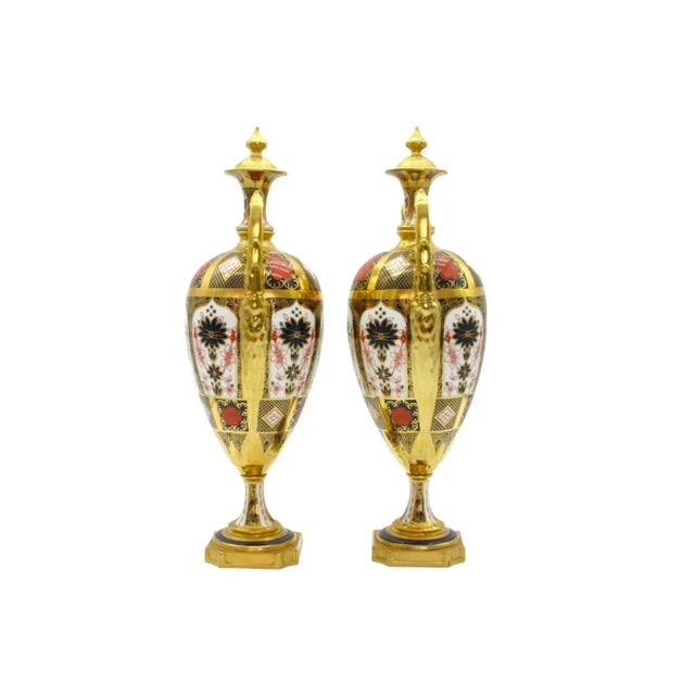 Beautifully gilt and hand painted Royal Crown Derby pair Imari pattern porcelain decorative urns/vases with gilt twin side...