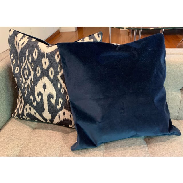 Pair of 20" square Ikat linen and velvet backing have hidden zippers and new down and feather inserts.