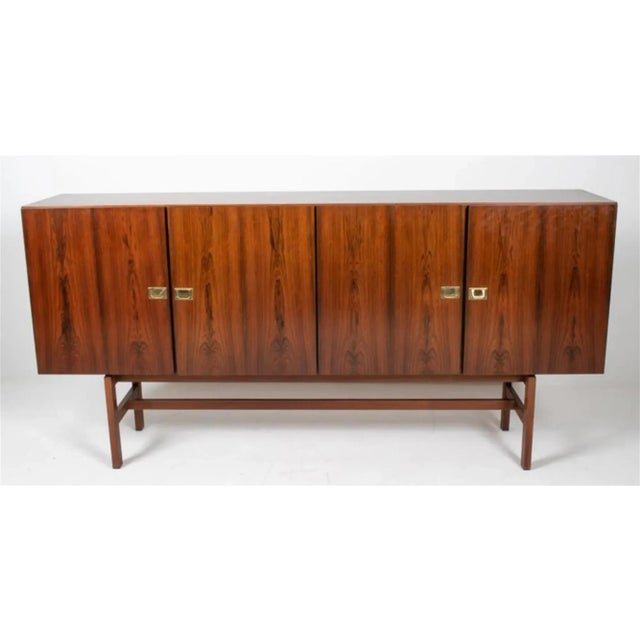 Rosewood Sideboard designed by Arne Vodder c 1965. Manufactured by Sibast Møbler. The stature and ‘lift” to this piece at...
