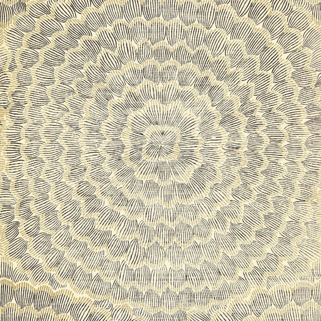 Overscale blossoms in a radiating pattern make a delicate and dreamy statement. The natural sisal ground adds dimension...