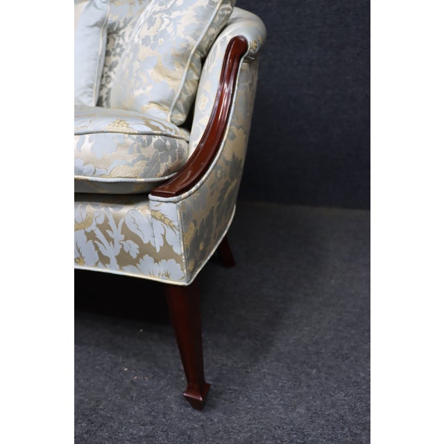 Elegant Kindel Grand Rapids Hepplewhite style camelback sofa crafted with a solid mahogany frame and graceful exposed...