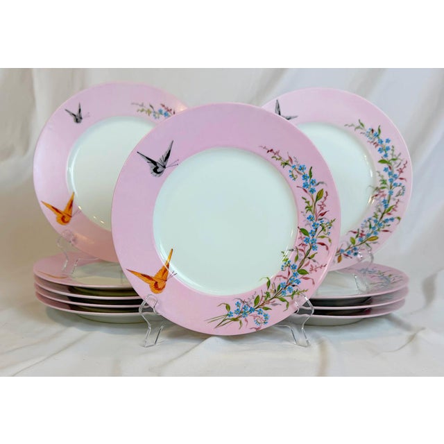 This is a beautiful set of ten antique Limoges porcelain dinner plates by Charles Field Haviland, featuring a feminine...