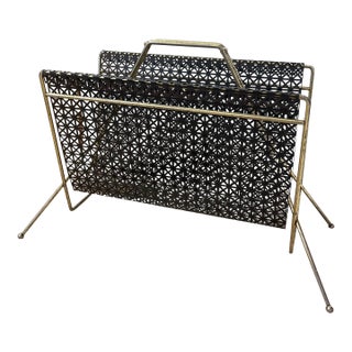 Mid-Century Modern Brass Toned and Black Enamel Metal Magazine Rack With Atomic Geometric Mesh Design. For Sale