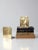 A sophisticated pair of mid-century brass bookends with a refined nautical sensibility. The substantial square forms are...