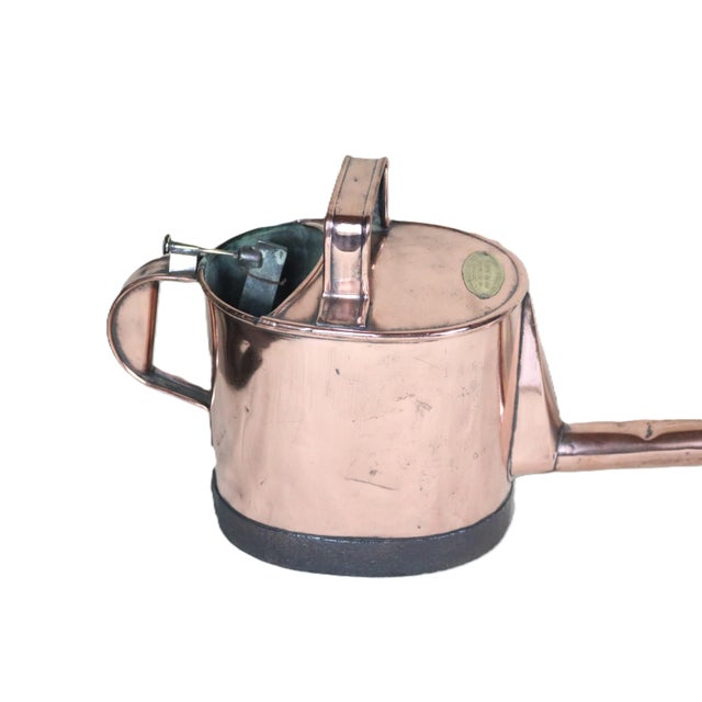 A rare French pouring can designed to top off barrels in the cellar while they age. The long neck is to allow for reach to...