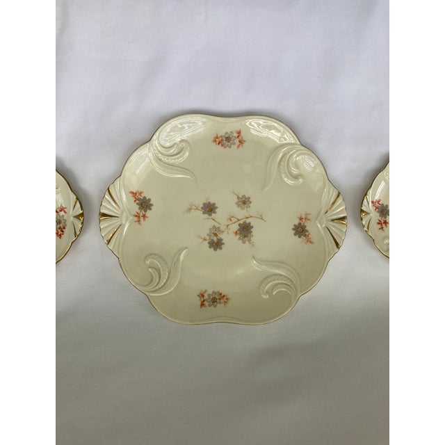 Vintage Eschenbach Porcelain Dessert Set with floral motif and gold accent. Consists of a small cake plate with four...