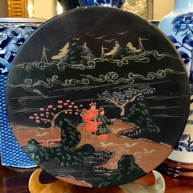 Vintage lacquered box with lovely figural and landscape scene on the top. Matte finish. Coral red, green, and brown...