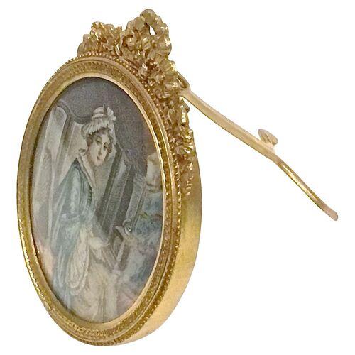 Antique ivory hand-painted portrait of an early 19th century woman in a delicate floral and ribbon crest atop a circular...