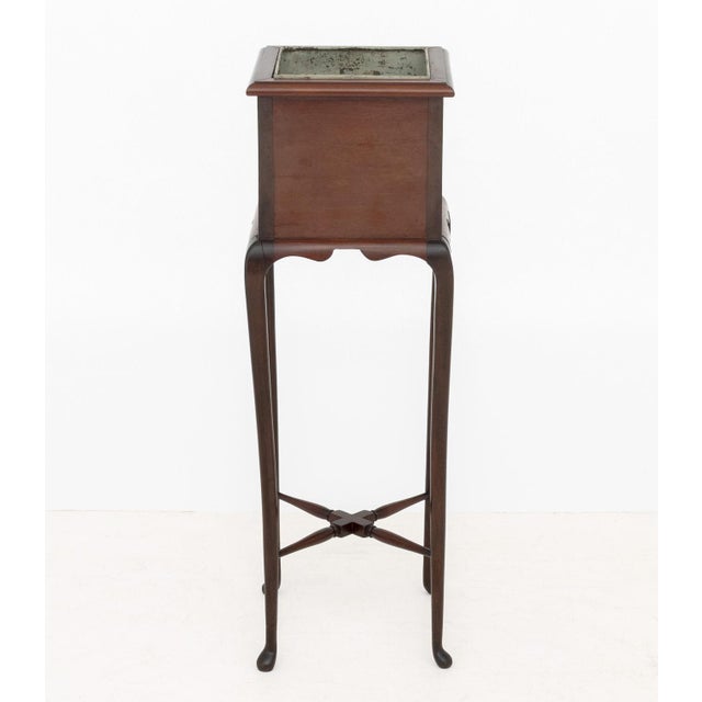 Edwardian Walnut Plant Stand, with metal liner and x-form stretcher. 36" H x 11.5" W x 11.5" D. Provenance: From a Forest...