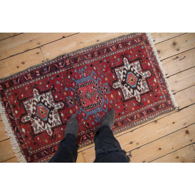 :: Classic Karaja with central hook and latch enveloped main medallion adorned at either end by mirrored squared...