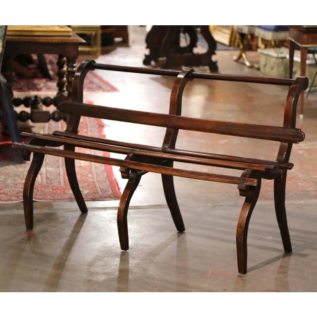 Elevate a hallway, entry, or foot-of-bed setting with this elegant antique French bench, crafted in solid oak circa 1880....