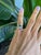 A pink tourmaline and a blue indicolite tourmaline sit side by side in a romantic toi et moi design at the centre of this...