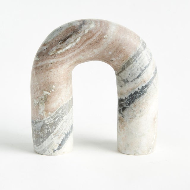 Honed to a semimatte finish, this stunning marble is specifically known for its unique darkBrown to lightBrown broad...