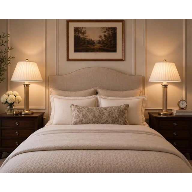 Striking pair of vintage Mid-Century Modern table lamps featuring clean lines, elegant proportions, and a timeless...