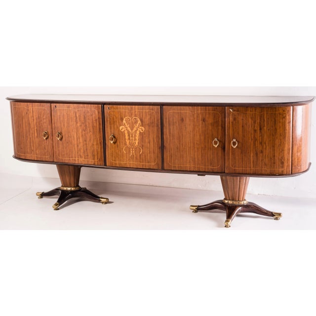 Beautiful sideboard with mirror i by Paolo Buffa, 1950s. The piece is really rare and important. The sideboard cabinet is...