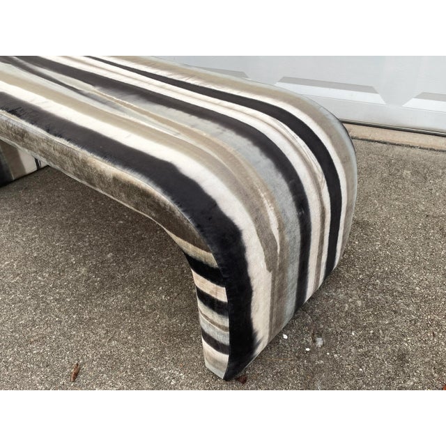 This bench was originally made around 1980 and has been recently reupholstered in a fine designer fabric. The bench is a...