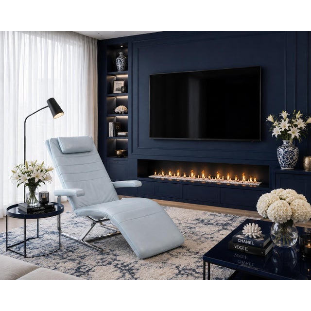 A unique, high-quality original designer armchair, "Vita," by Ewald Schillig, featuring elegant genuine leather upholstery...