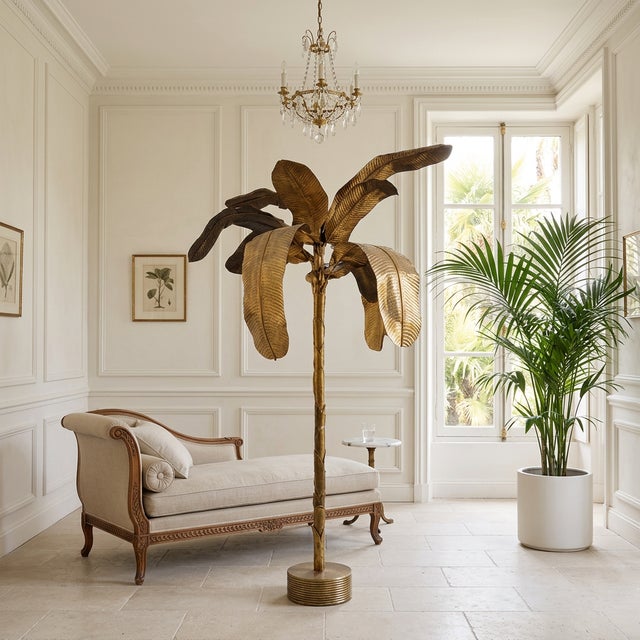 1970s Hollywood Regency brass banana tree floor sculpture. The piece features a sculptural brass trunk with large...