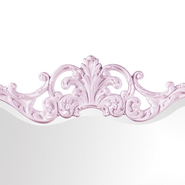 The Talida Mirror is a lovely piece featuring an ornate, textured frame adorned with decorative flourishes. The entire...