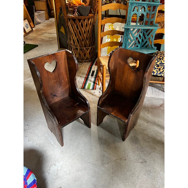 Up for consideration is a beautiful vintage pair of wooden country core, heart shaped, children's chairs. These would look...