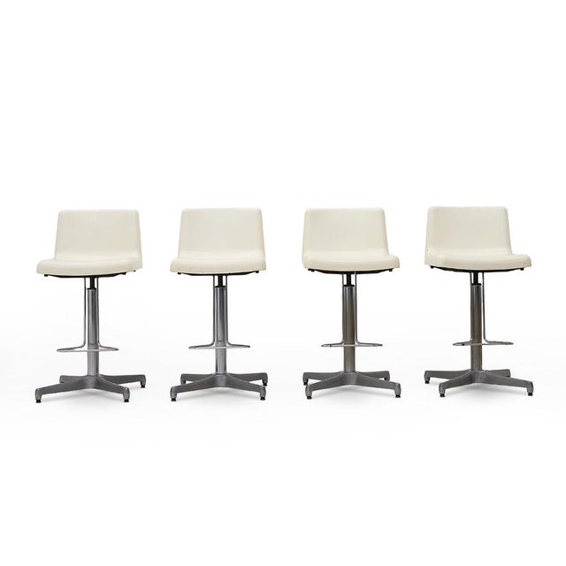 4 stools produced in Italy from vague in the 1960s. Support base in die -cast aluminum and chromed metal. Setle in printed...