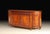 Handcrafted in Italy, this sideboard is made from select walnut and burl veneers with a book-matched burl top and fine...