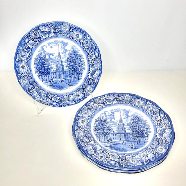Celebrate classic American history with this beautiful **set of four vintage Staffordshire Liberty Blue dinner plates**,...
