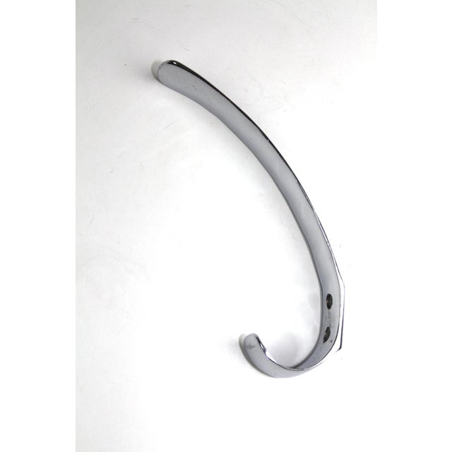 Heavy, solid hooks cast brass, chrome-plated This piece is designed in the style of the selected designer and/or manufacturer
