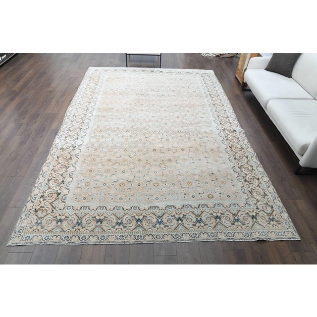 Vintage Persian Hand-Knotted area rug is a semi-antique vintage area rug. The '70s Eastern region of Anatolian's unique...
