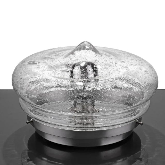 Rare pair of mid-century wall or ceiling lights in a special glass design. Original from the 1960s / 1970s. The special...