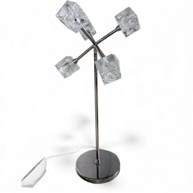 The ikea ice cube lamp is a striking chrome table lamp designed to enhance any living space with its unique sculptural...