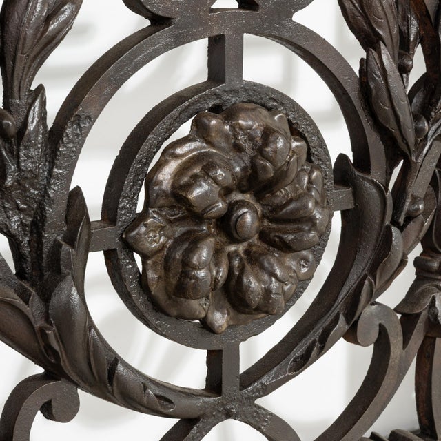 A circa 1860 French console table in wrought iron topped with Belgian bluestone, reflecting neoclassical design...