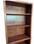Classic vintage solid wood bookcase featuring a warm oak finish and beautiful natural wood grain throughout. The tall,...