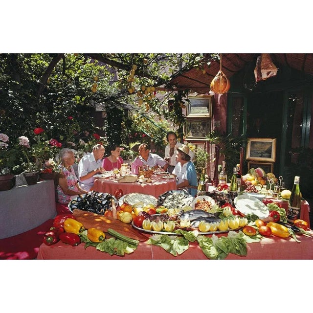 Lunch At La Pigna 1980 by Slim Aarons Slim Aarons Limited Estate Edition US restaurateurs Gilda Cioffi, owner of Mama...