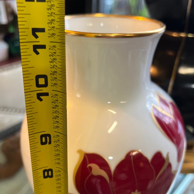 Up for consideration is a beautiful vintage Asian style white ceramic vase with red flowers, box is included. This would...