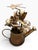 Whimsical vintage Berkeley Designs musical sculpture featuring a richly patinated copper-tone watering can overflowing...