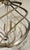 Original retail $1640, stylish Currey & Company Silver Orb Roussel Chandelier, showroom floor sample