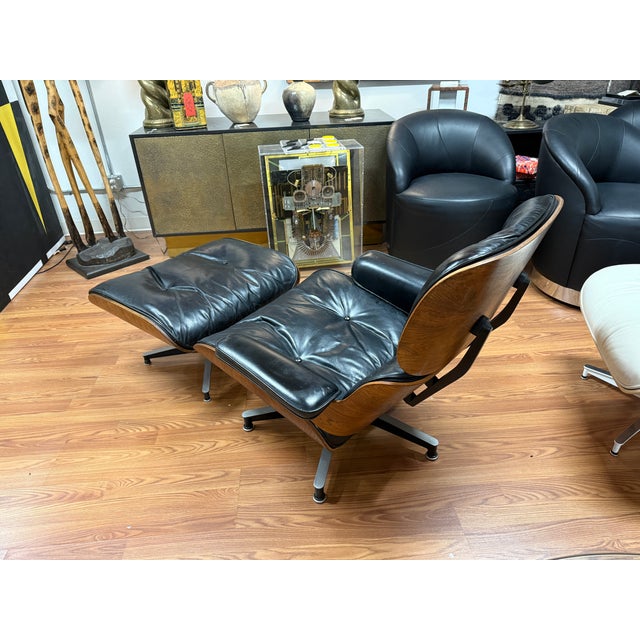 We were fortunate to acquire this rare 1964 Eames chair and Ottoman in black leather and Rosewood veneer. The label dates...