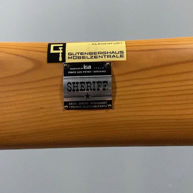 Brazilian Design Set, consisting of an armchair and footrest, designed by Sérgio Rodrigues and produced by ISA, Italy. The...