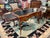 20th century reproduction of a Louis XV style writing desk. Beautiful geometric parqutry inlay, serpentine shape, leather...