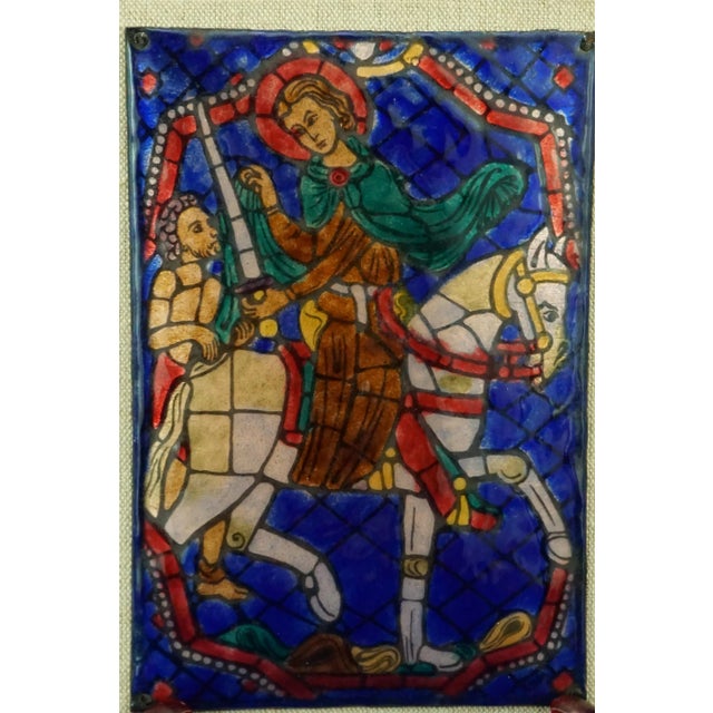 Copper plaque decorated with Limges enamels, cooked at very high temperatures, depicting Saint Martin on horseback and a...