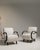 A dining chair whose cream boucle upholstery gives it real character at first glance. Originating in France during 1950s,...