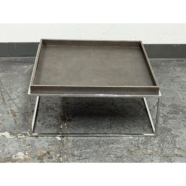 Design Plus Gallery presents the Hudson Coffee Table by Anthony Cox for Restoration Hardware. This tailored design pairs...