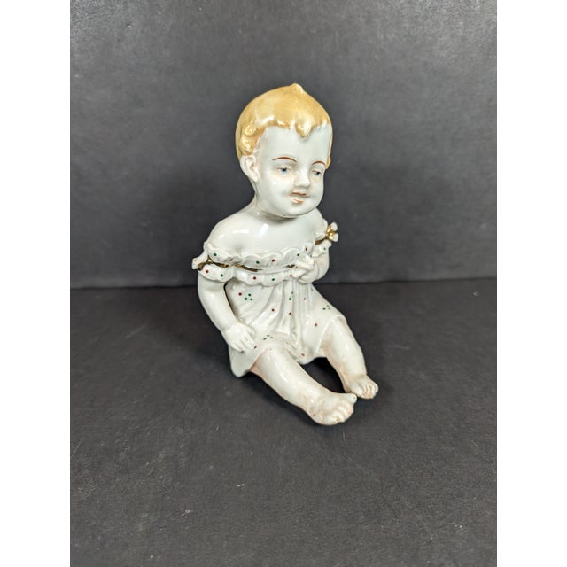 This is a rare antique German bisque porcelain piano baby figurine, it has a backstamp marked Germany on the back. This...