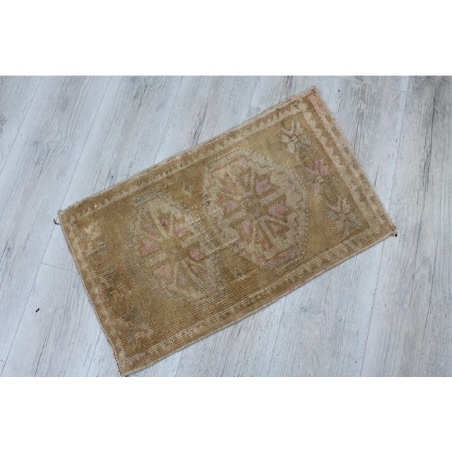 This beautiful, traditional vintage, handwoven Turkish rug is approximately 60 years old. It is handmade of very fine...