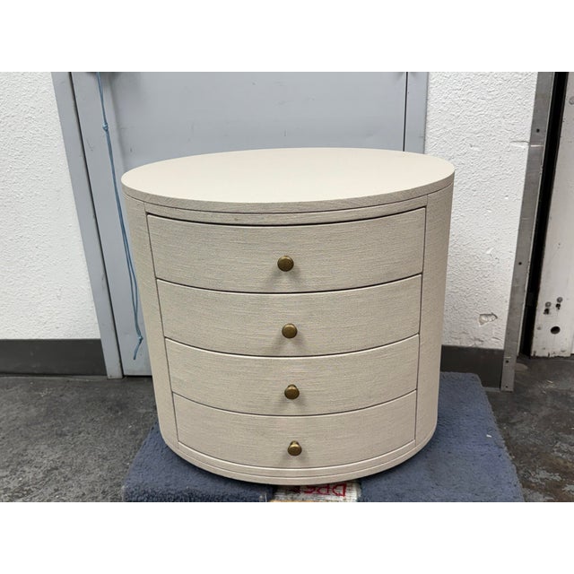 Design Plus Gallery presents the Beatrice Modern Classic Cream Painted Linen Oval Nightstand from Kathy Kuo. An oval case...